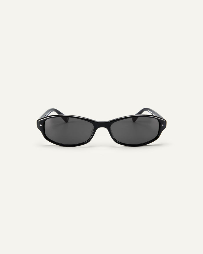 Face shot of Bonnie Clyde Coco sunglasses in black with black lenses.