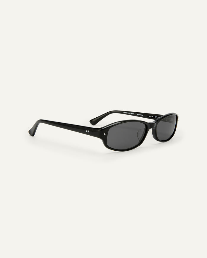 Quarter shot of Bonnie Clyde Coco sunglasses in black with black lenses.