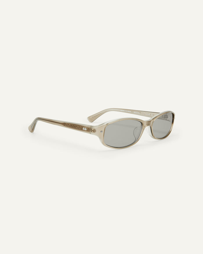 Side shot of Bonnie Clyde Coco sunglasses in grey with grey lenses.
