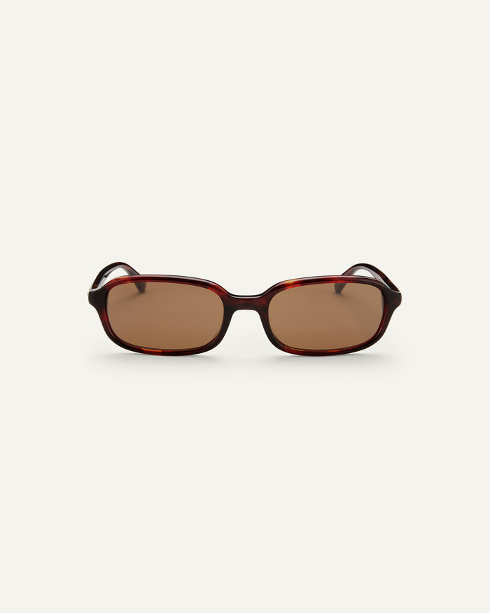 Face shot of Bonnie Clyde Comedy sunglasses in Red Tort.