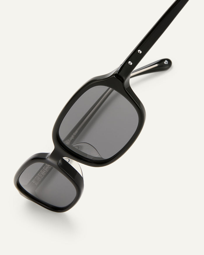 Side shot of Bonnie Clyde Comedy sunglasses in black.