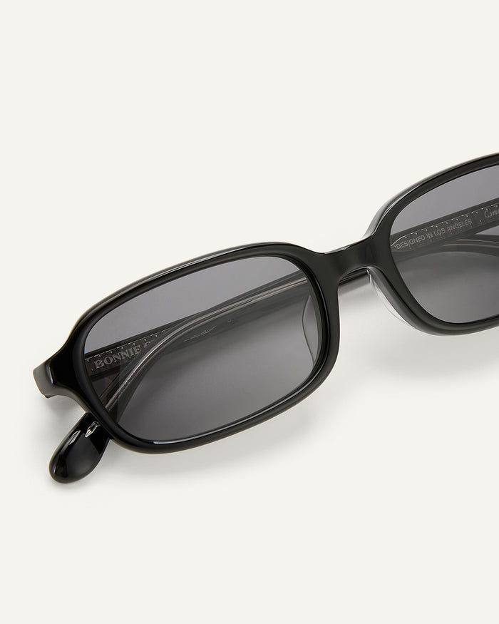 Close-up shot of Bonnie Clyde Comedy sunglasses in black.