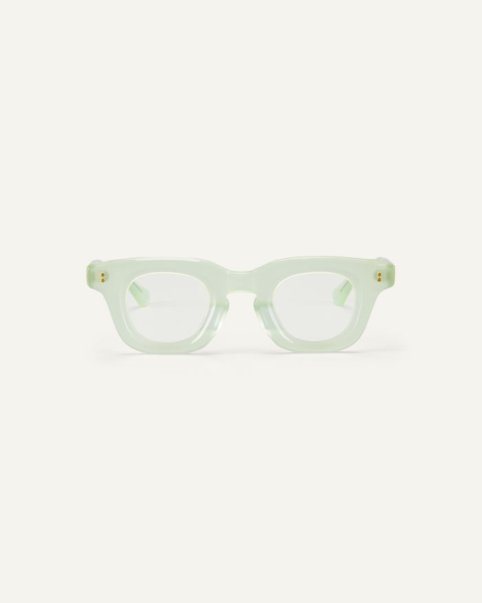 Face shot of Bonnie Clyde Crybaby optical frames in milky jade with clear lenses.