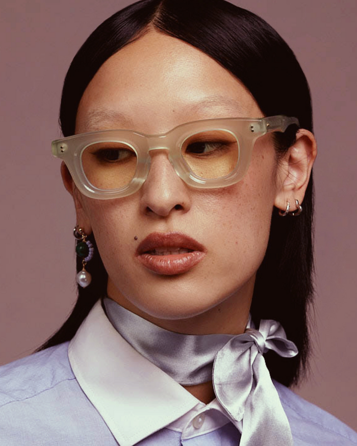 Quarter shot of Bonnie Clyde Crybaby optical frames in milky jade with clear lenses.