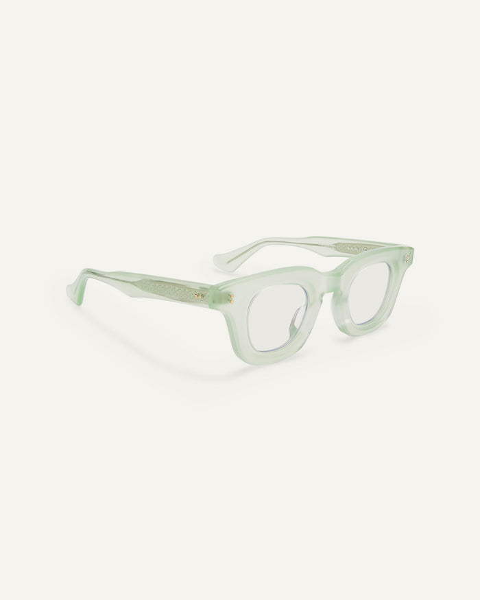 Side shot of Bonnie Clyde Crybaby optical frames in milky jade with clear lenses.