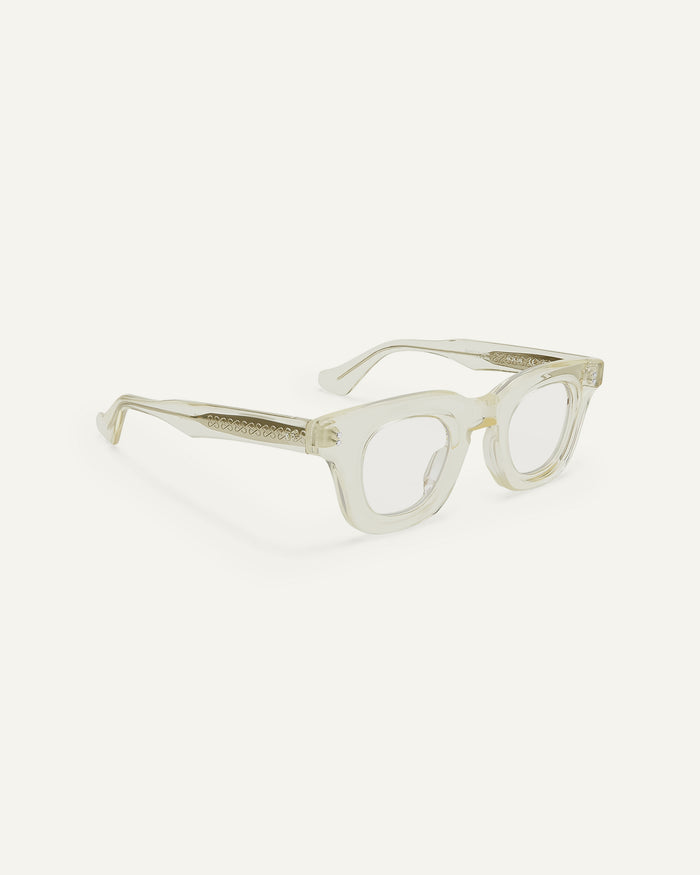 Side shot of Bonnie Clyde Crybaby optical frames in transparent yellow with clear lenses.
