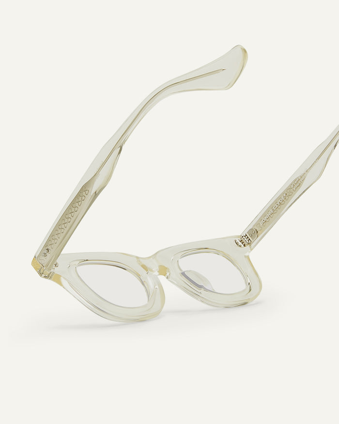 Close-up shot of Bonnie Clyde Crybaby optical frames in transparent yellow with clear lenses.