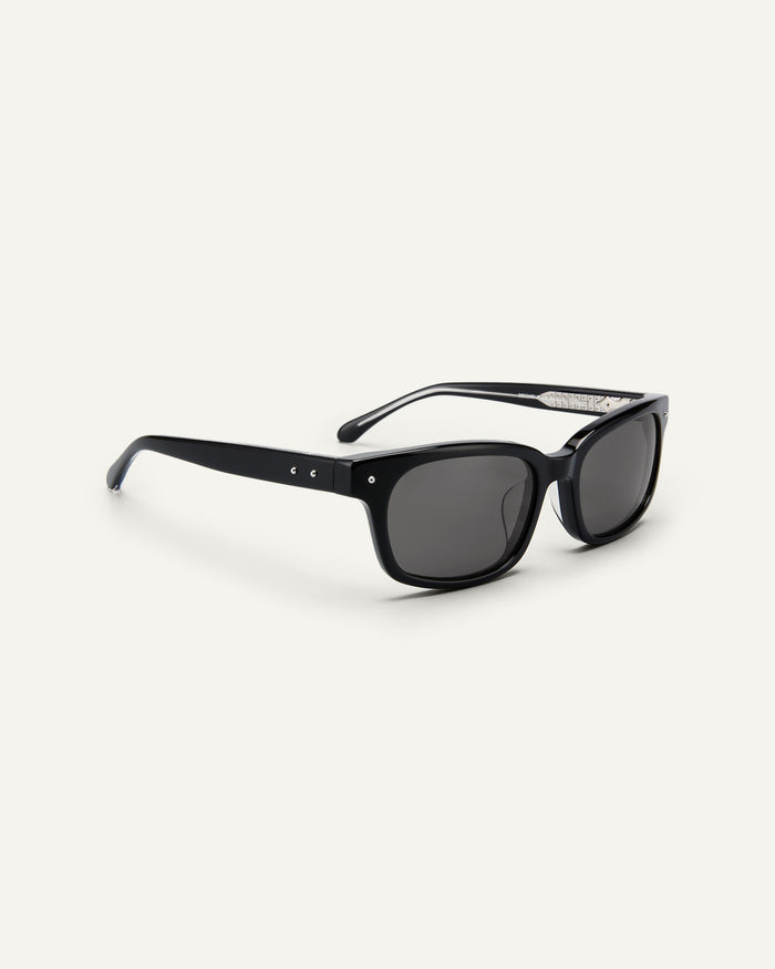 Side shot of Bonnie Clyde Dagger sunglasses in black with black lenses.