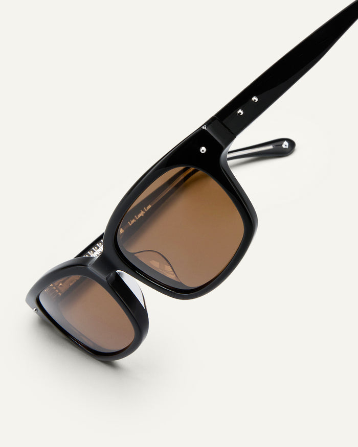 Additional view of Bonnie Clyde Dagger sunglasses in black with brown lenses.