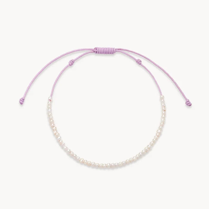 dainty lavender pearl anklet on white background