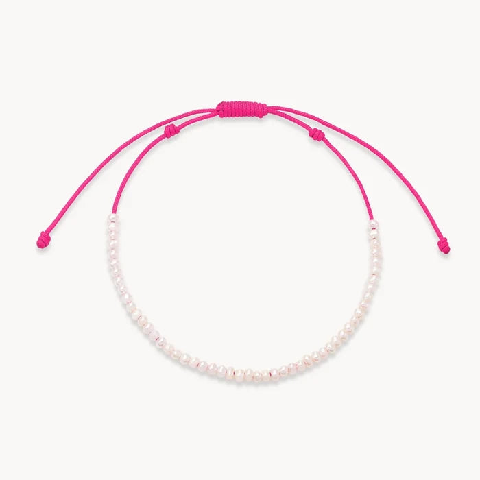 dainty pink pearl anklet - pink cord on white background