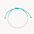 dainty teal pearl anklet - teal cord on white background