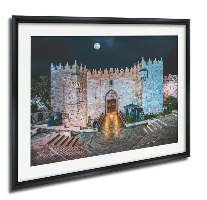 a castle with a full moon in the night sky, surrounded by a courtyard with steps leading up to the entrance.
