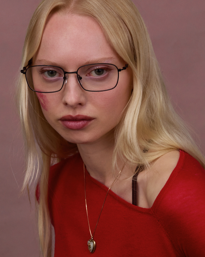 Quarter shot of Bonnie Clyde Dance Dance optical frames in black and red tortoise with clear lenses.