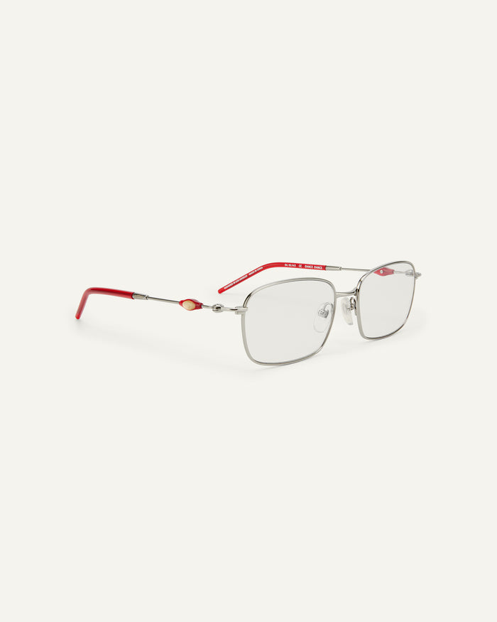 Side shot of Bonnie Clyde Dance Dance optical frames in silver and layered red with clear lenses.
