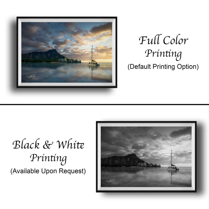 The image is a collage of two framed pictures. The top picture is a full color print of a seascape with a sailboat, while the bottom picture is a black and white print of the same seascape. Both pictures are framed and available upon request.