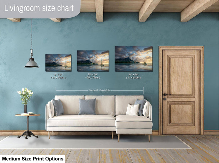 a living room with a white sofa and a wooden door. Above the sofa, there is a livingroom size chart that provides the dimensions of three different paintings in the room.