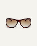 Face shot of Bonnie Clyde Dog sunglasses in red tortoise with brown gradient lenses.