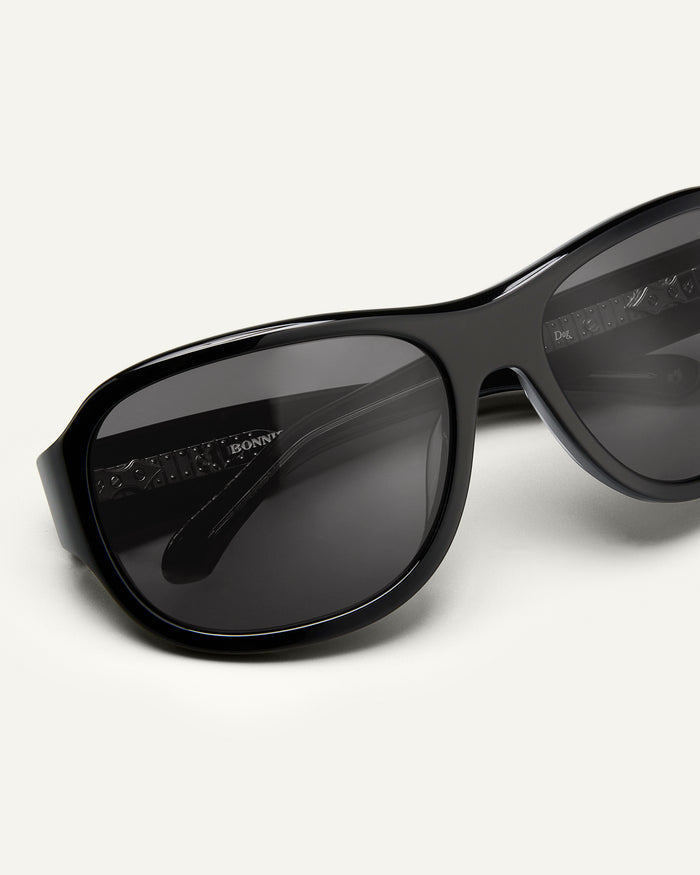 Detail shot of Bonnie Clyde Dog sunglasses in black with black lenses.
