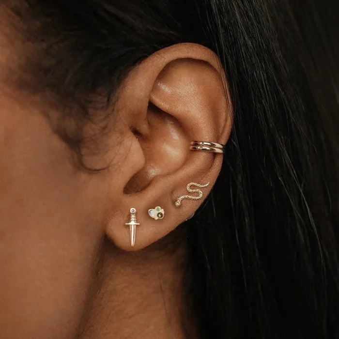 Earth Element Stud Earring in 14k yellow gold, shown worn on hand