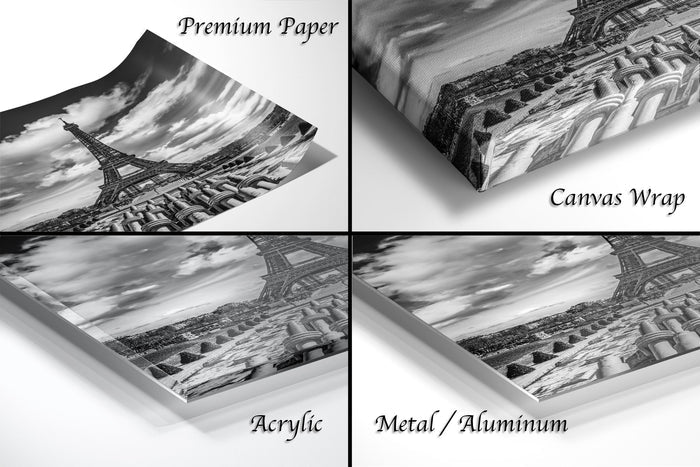 four different views of the Eiffel Tower, including a close-up of the tower, a landscape view, a close-up of the tower's reflection, and a close-up of the tower's reflection on a canvas wrap.