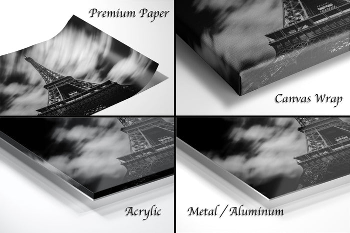 The image is a collage of four different images, each depicting the Eiffel Tower in various ways. The images include a close-up view of the tower, a wide-angle shot, a close-up of the tower's intricate details, and a close-up of the tower's reflection on a surface. The images are labeled as "Premium Paper", "Canvas Wrap", "Acrylic", and "Metal/Aluminum" to describe the materials used in the prints.