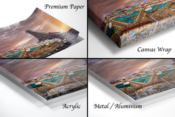 The image is a collage of four different images, each depicting a different aspect of the Eiffel Tower. The images include a close-up view of the tower's intricate details, a wide-angle shot of the tower against a cloudy sky, a close-up of the tower's roof, and a close-up of the tower's facade. The images are labeled as "Premium Paper", "Canvas Wrap", "Acrylic", and "Metal/Aluminum" to describe the materials used in the prints.