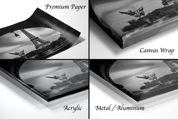 four different views of a black and white photograph of the Eiffel Tower, with each view labeled as either "Premium Paper", "Canvas Wrap", "Acrylic", or "Metal/Aluminum".