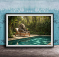 A large elephant sits on a wooden lounge chair in a lush, green forest, with a swimming pool in the foreground.