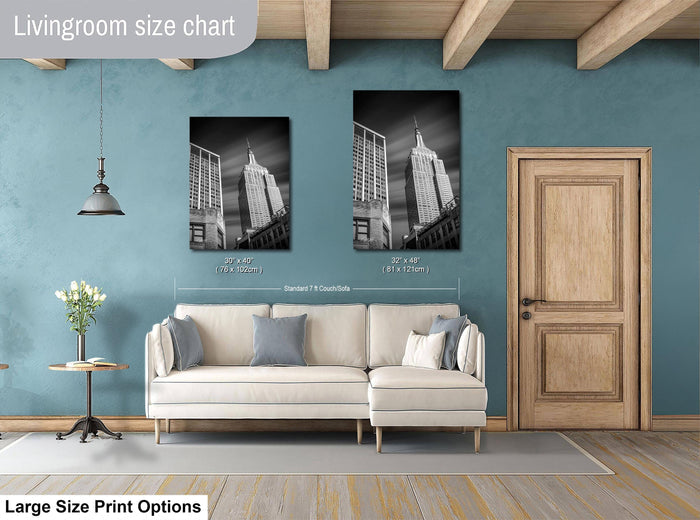 a living room with blue walls and a white couch