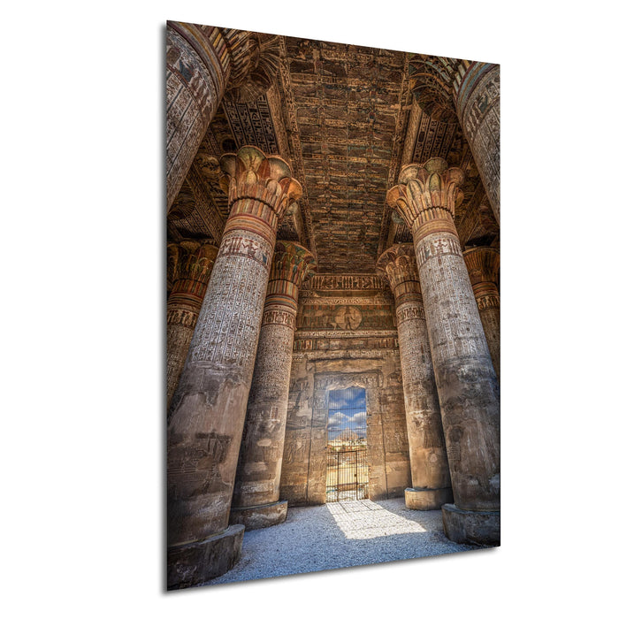 an ancient Egyptian temple with towering columns and intricate carvings, creating a sense of grandeur and majesty.