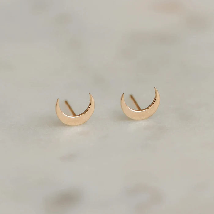 Everyday Larger Crescent Moon Earring in 14k yellow gold, studio detail view