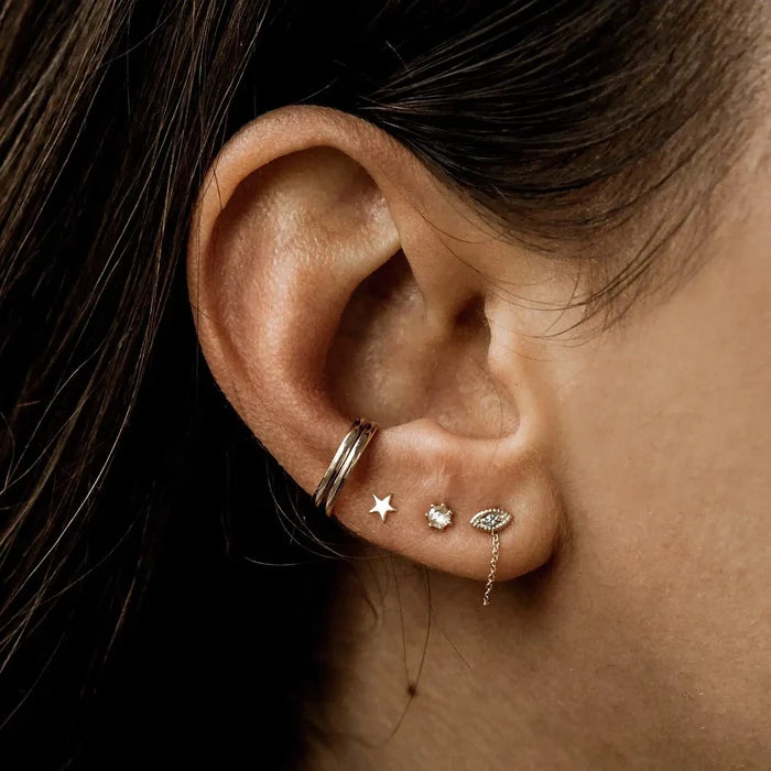 Everyday Little Stella Star Earring in 14k yellow gold, alternate angle detail view