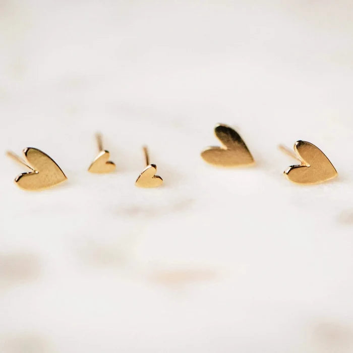 Everyday Love Lineage Pair Heart Earrings in 14k yellow gold with bundle, studio detail view