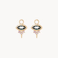 Front view of a pair of evil eye shaped earring charms with marquise-shaped london blue topaz at the centre and three small pink sapphires underneath followed by a small spike at the bottom displayed on a clean off-white background.