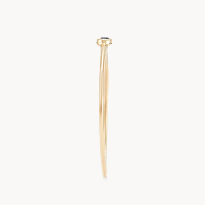 new bezel set serendipity blue sapphire  stacking ring - 10k yellow gold side view