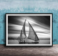 This luxury black and white fine art photograph captures a felucca sail boat drifting along the Nile River at sunset near Luxor, Egypt. Soft fog and minimalist composition create a timeless, monochrome aesthetic rooted in Egyptian river culture. Ideal for collectors and interior designers seeking refined, museum-quality wall art that embodies elegance, simplicity, and enduring calm. black white nile river art, felucca sailboat wall decor, luxor egypt monochrome print, luxury minimalist wall art