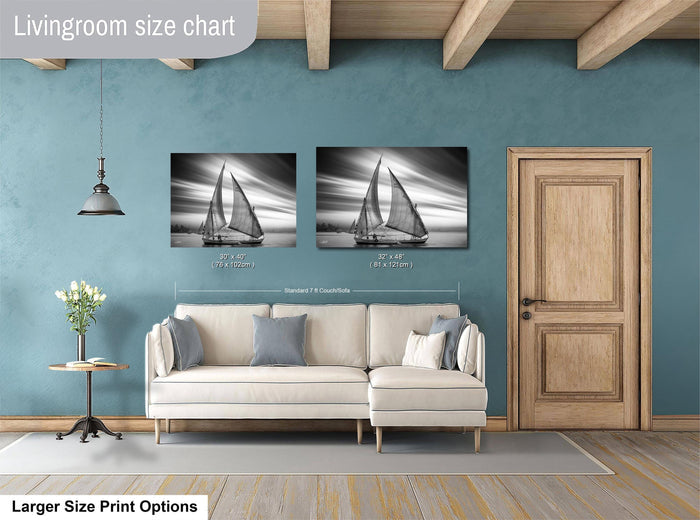 This luxury black and white fine art photograph captures a felucca sail boat drifting along the Nile River at sunset near Luxor, Egypt. Soft fog and minimalist composition create a timeless, monochrome aesthetic rooted in Egyptian river culture. Ideal for collectors and interior designers seeking refined, museum-quality wall art that embodies elegance, simplicity, and enduring calm. black white nile river art, felucca sailboat wall decor, luxor egypt monochrome print, luxury minimalist wall art