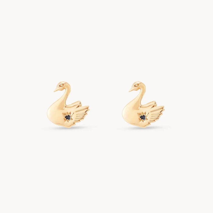 Floating Swan Studs in 14k yellow gold with blue sapphire