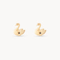 Floating Swan Studs in 14k yellow gold with blue sapphire