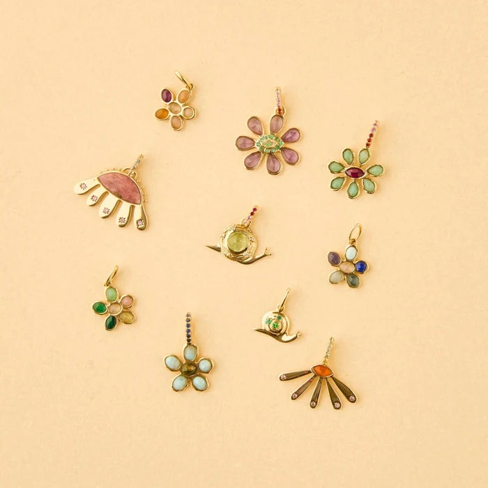 Forget-me-not Flower Charm in 10k yellow gold with larimar and bumblebee jasper and sapphires, studio detail view 2