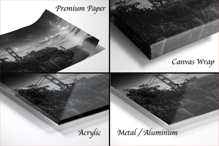 four different views of a black and white photograph of a bridge, with each view labeled as either "Premium Paper", "Canvas Wrap", "Acrylic", or "Metal/Aluminum".