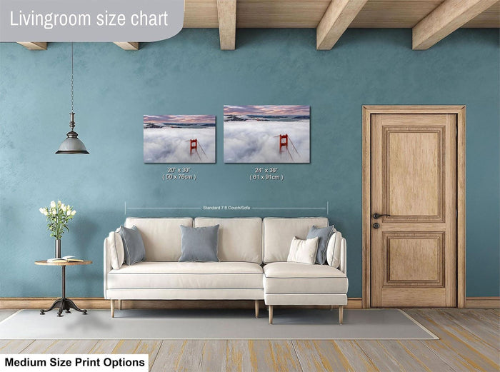 a living room with a white sofa, a wooden door, and a painting of the Golden Gate Bridge in the background. The living room has a blue wall and a wooden floor.