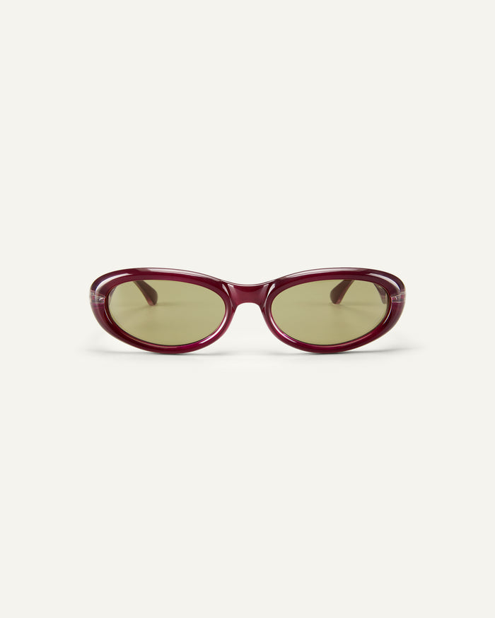 Face shot of Bonnie Clyde Groupie sunglasses in wine with olive lenses.