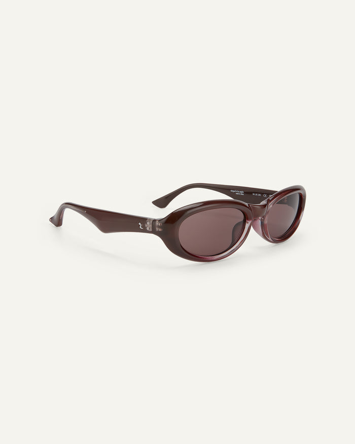 Side shot of Bonnie Clyde Groupie sunglasses in brown with brown lenses.