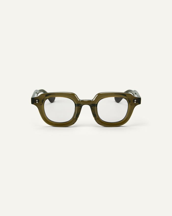 Face shot of Bonnie Clyde Gustave optical frames in dark green with clear lenses.