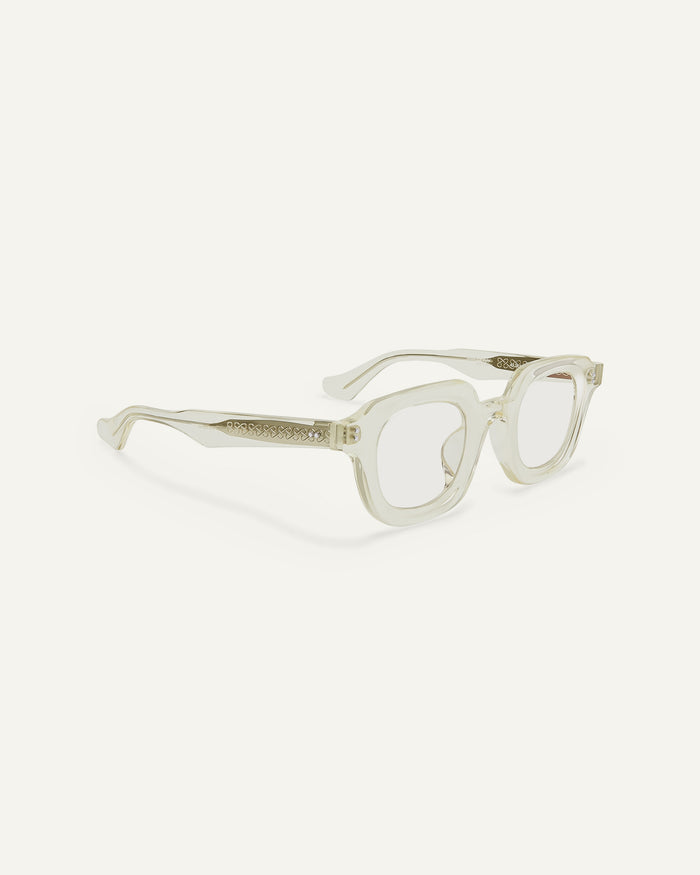 Side shot of Bonnie Clyde Gustave optical frames in transparent yellow with clear lenses.