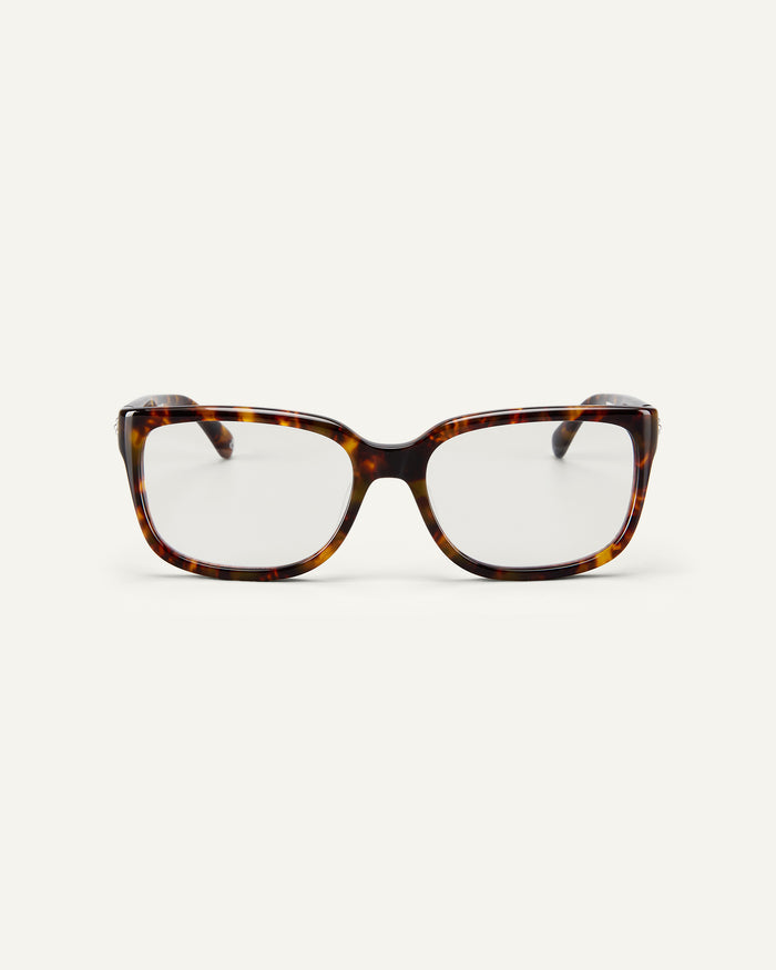 Face shot of Bonnie Clyde Guts optical frames in tortoise with clear lenses.