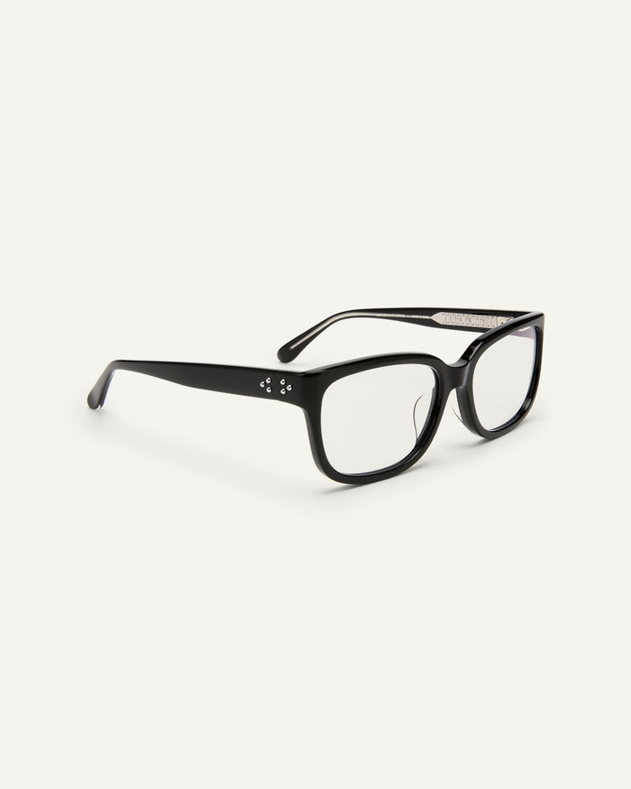 Side shot of Bonnie Clyde Guts optical frames in black with clear lenses.