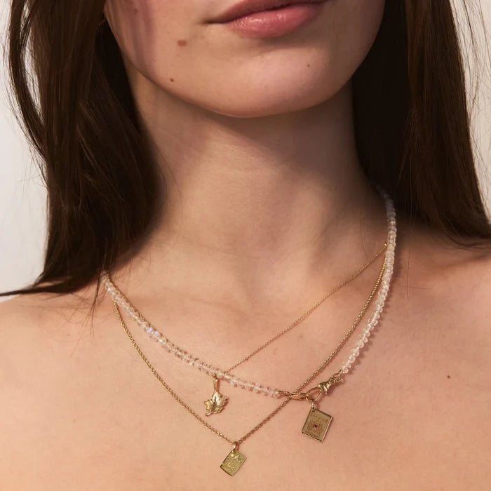 Halifax Postcard Charm in 10k yellow gold with diamond, alternate angle detail view